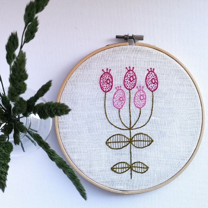 Pink flower hand embroidery with seed stitch