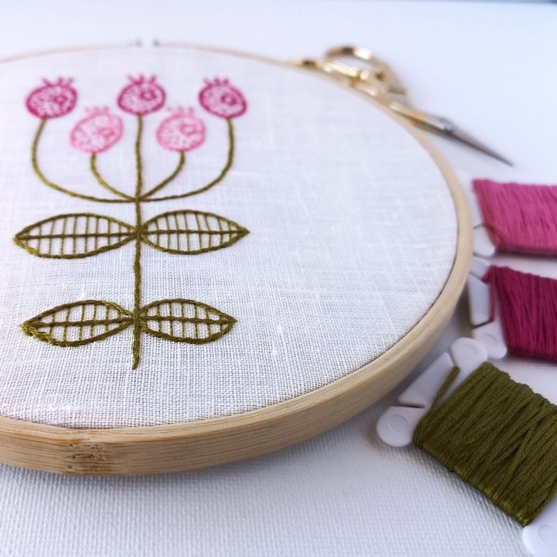 Pink modern flower embroidery in a hoop