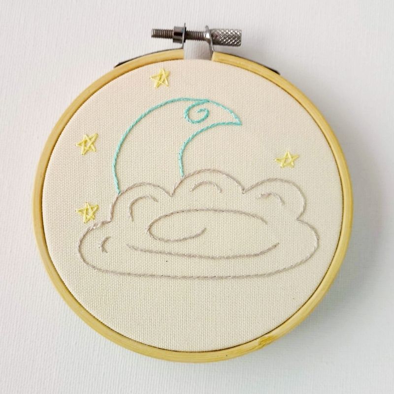 Baby moon design for hand embroidery. Framed in a hoop