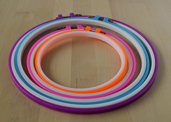 Plastic embroidery hoops of different colors