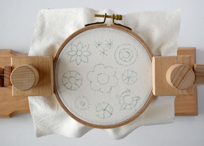 Ready to stitch fabric in a hoop on a hoop stand image