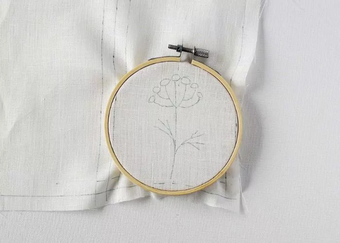 Frame the fabric into the hoop for embroidery