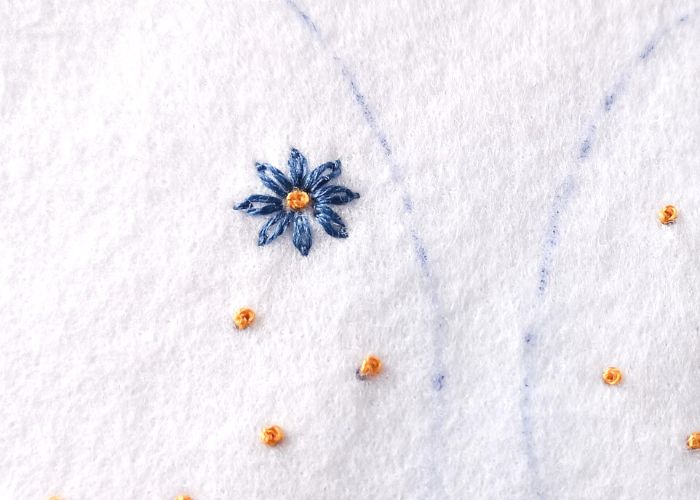 Embroider petals with Lazy daisy stitch