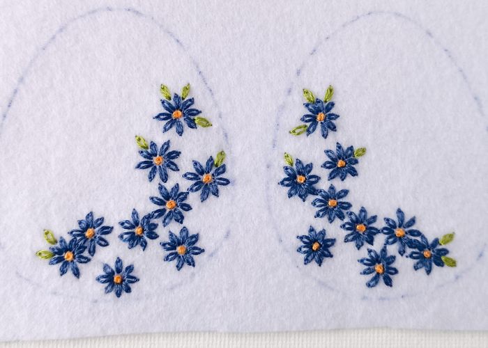 Embroider the leaves with detached chain stitch