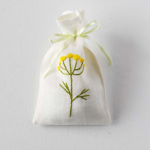 Scented sachet with yellow floral embroidery
