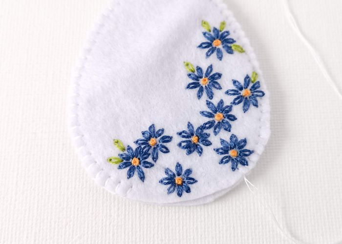 Sew the ornament with blanket stitch