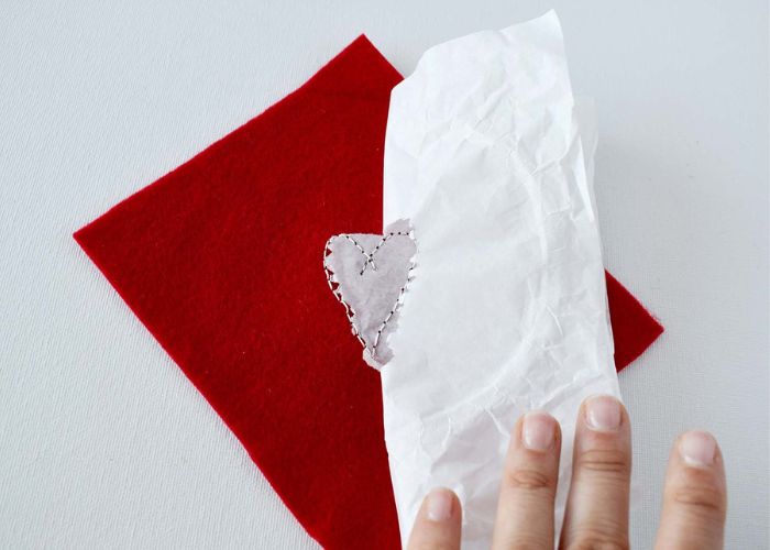 Remove tissue paper