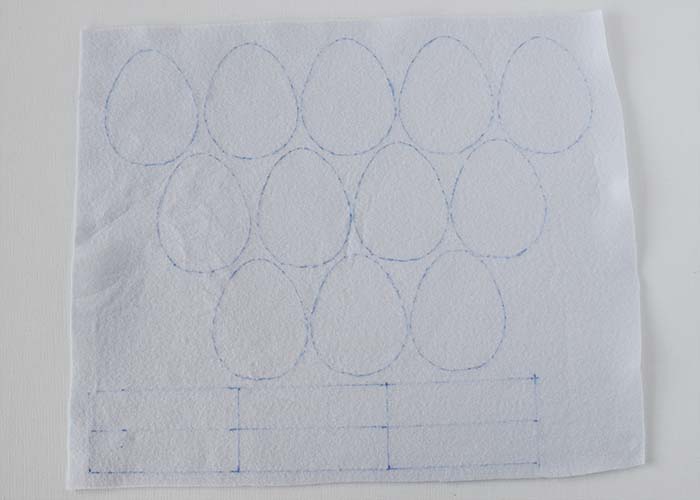 Transfer the egg pattern to the fabric