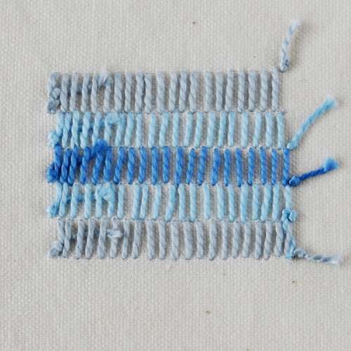 Back side of embroidery with buttonhole shading stitch