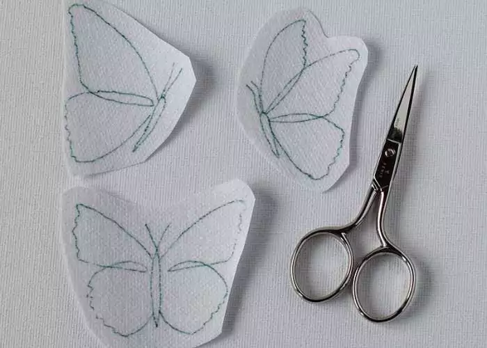 Butterfly outlines drawn on dissolvable stabilizer ready for embroidery