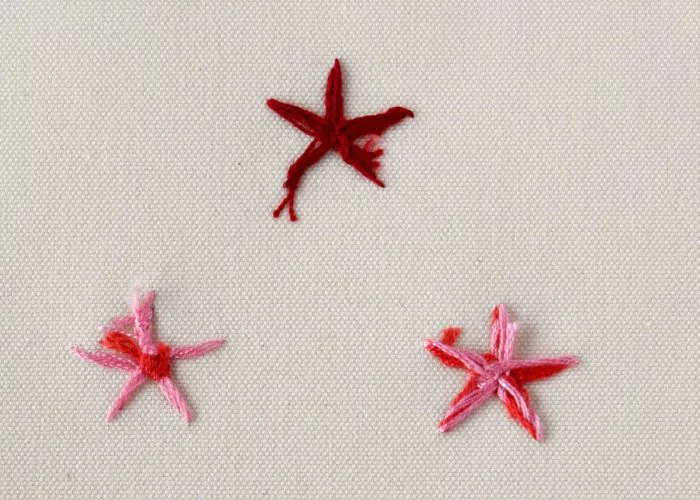 Reverse side of lazy daisy stitches