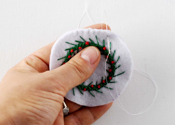 Sew the pieces of the ornament with blanket stitch