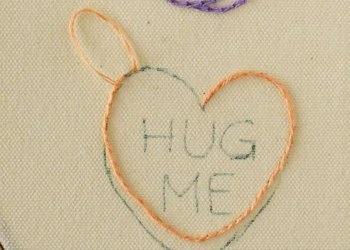 Peach heart outline Stem stitch; stem embroidery stitch tutorial image2; stem stitch embroidery tutorial image example2; how to do the stem stitch example2 ; how to embroider stem stitch example2; learn stem stitch image example2; stem stitch tutorial image example2