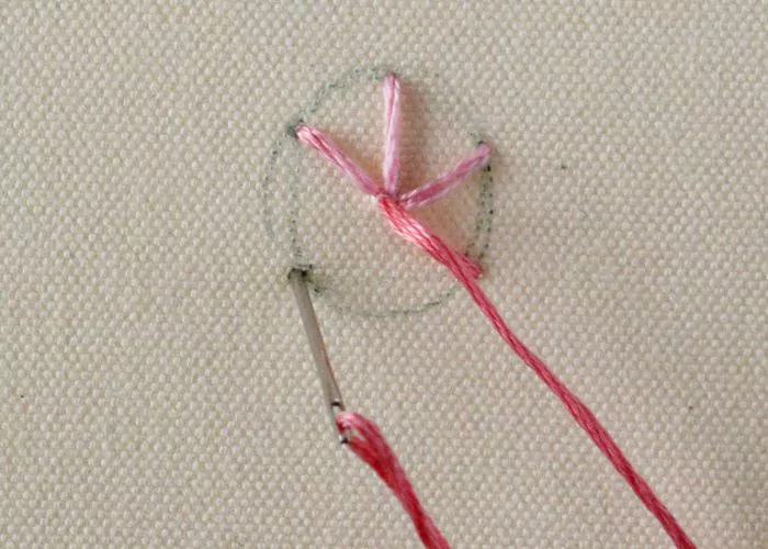 Woven spider wheel stitch step 1