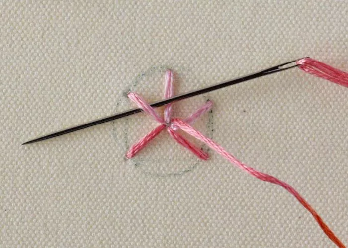 Woven spider wheel stitch step 2