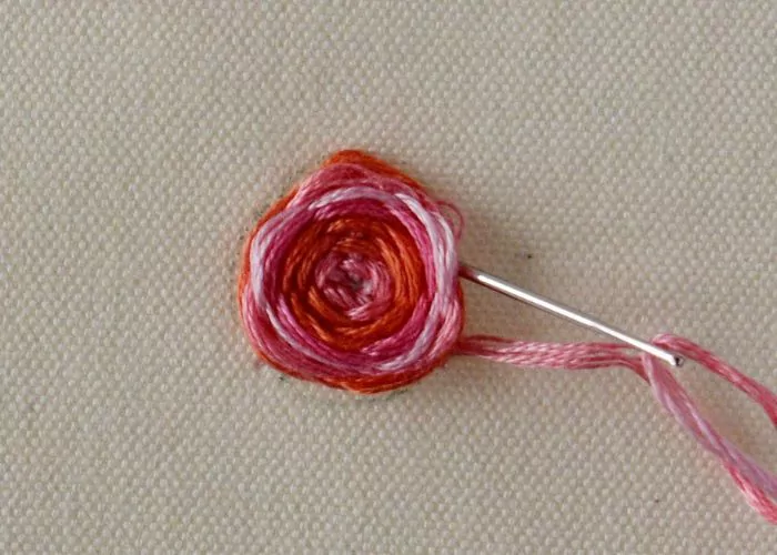 Woven spider wheel stitch step 6 - secure the thread