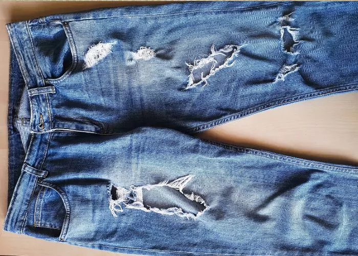 Blue jeans with holes