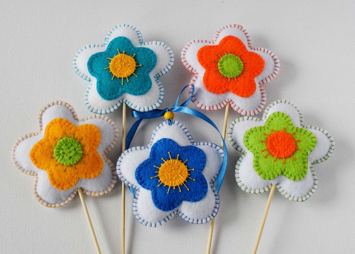 Floral spring felt ornaments made with bright colored felt fabric