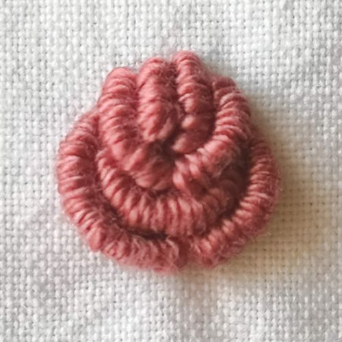 Pink flower embroidered with Bullion stitch