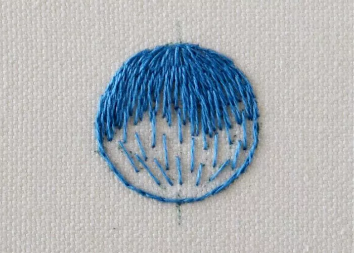 Add the rows of stitches to fill one side of the shape