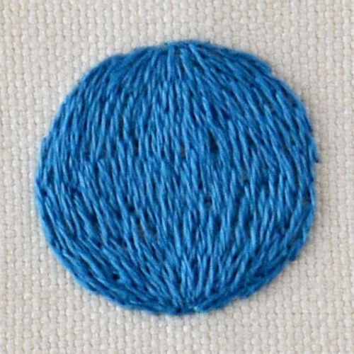 Blue sphere embroidery with long and short stitch