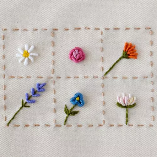 Six bullion stitch flowers embroidered