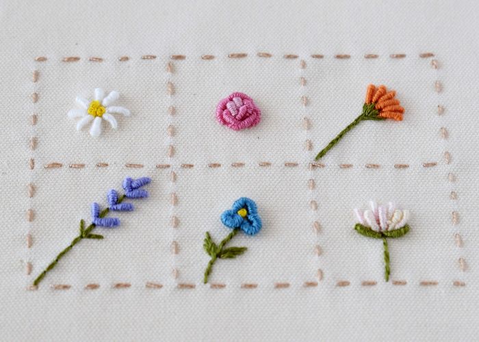 A finished sampler with six Bullion stitch flowers