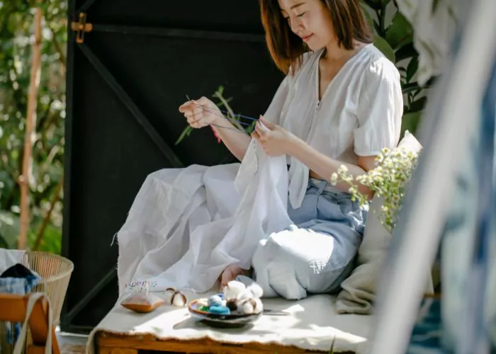Woman stitching
