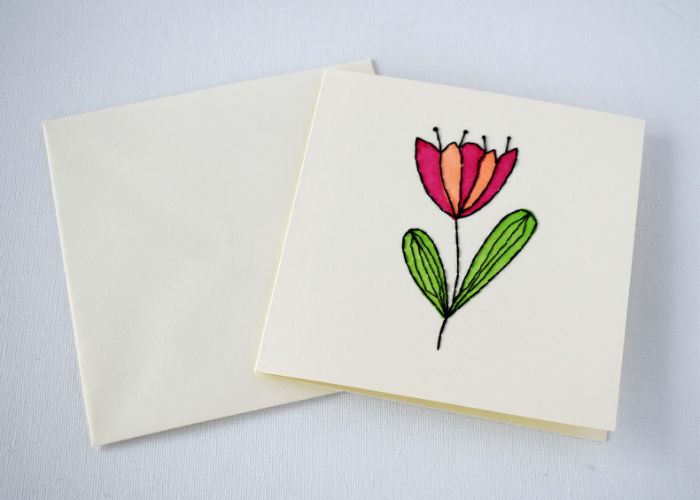 Hand embroidered card with a flower for mothers day