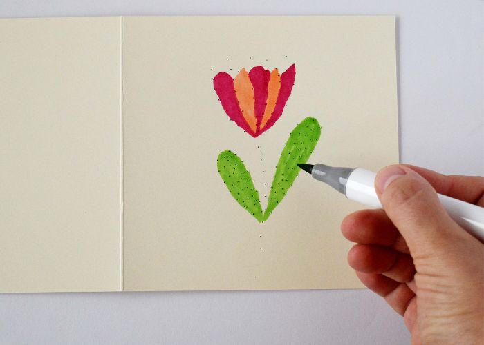 Color the flower with markers