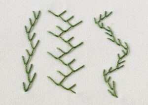 Double Feather Stitch embroidery with green pearl cotton