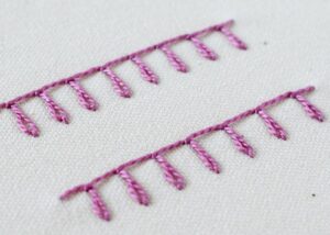 Basque Stitch embroidery with pink pearl cotton thread