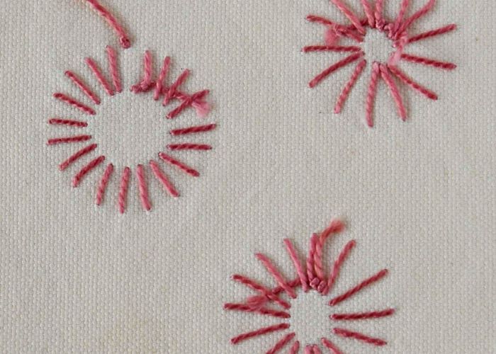 Sun Wheel Stitch embroidery with pearl cotton thread rear side