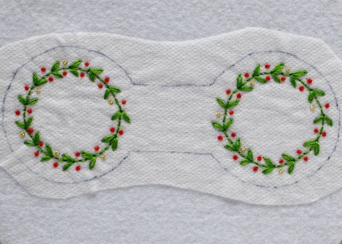 Hand embroidered Christmas wreaths