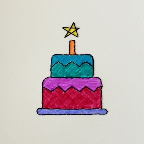 Hand embroidered birthday card with a colorful cake