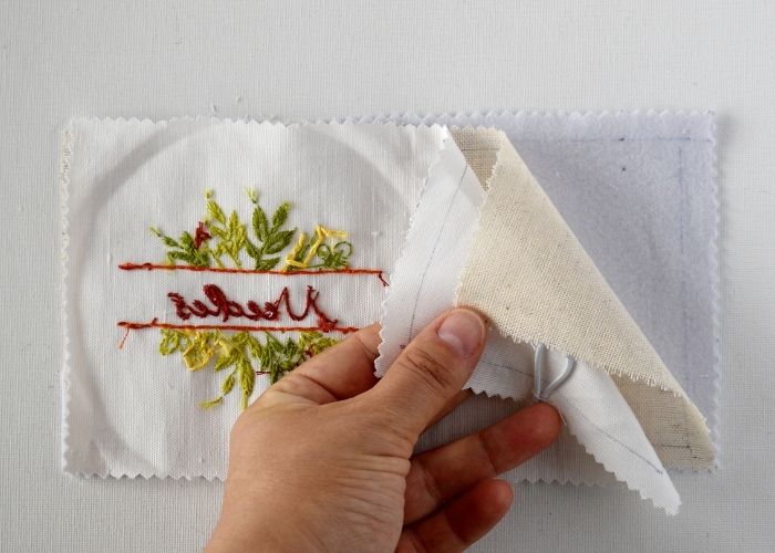 Assemble the layers of the needle book