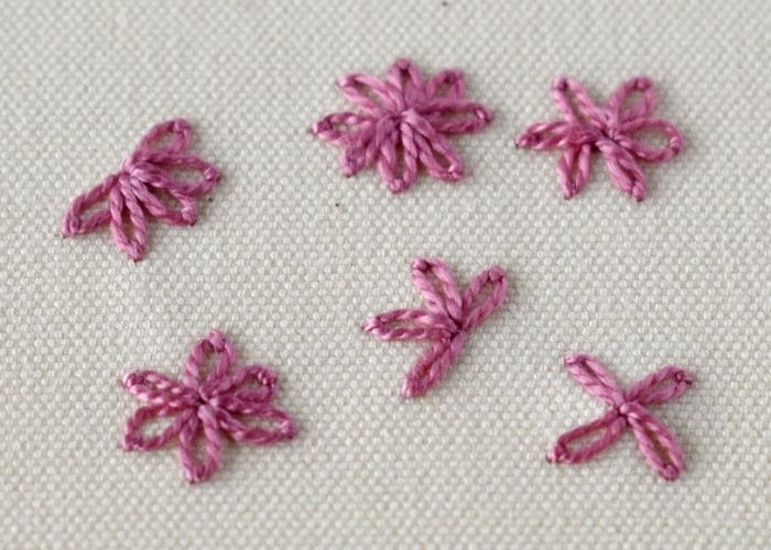 Lazy Daisy Stitch embroidery with pink pearl cotton thread