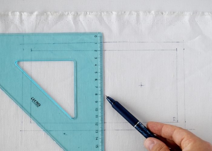 Measure and mark the cover fabric of the needlebook