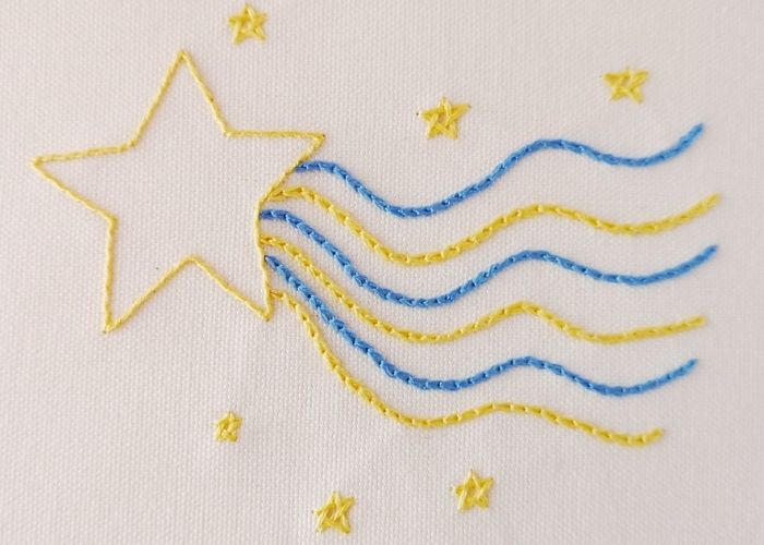 Milky way embroidery pattern with chain stitch whipped backstitch and woven stars