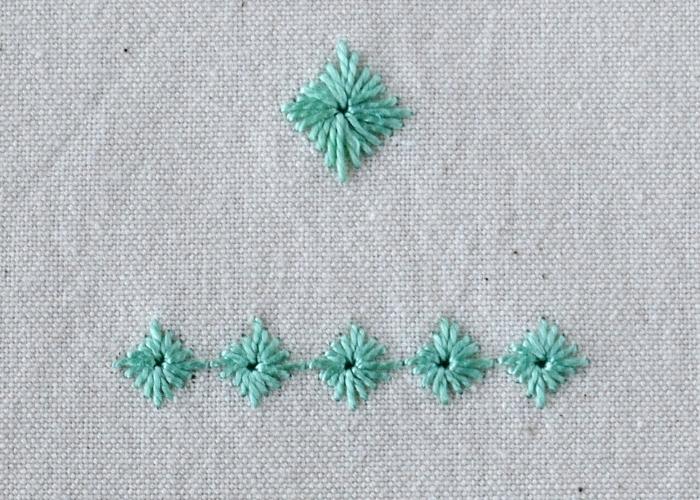 Diamond Eyelet Stitch Embroidery with green perle cotton