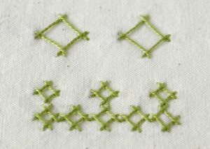 Herringbone Square Stitch embroidery with green pearl cotton