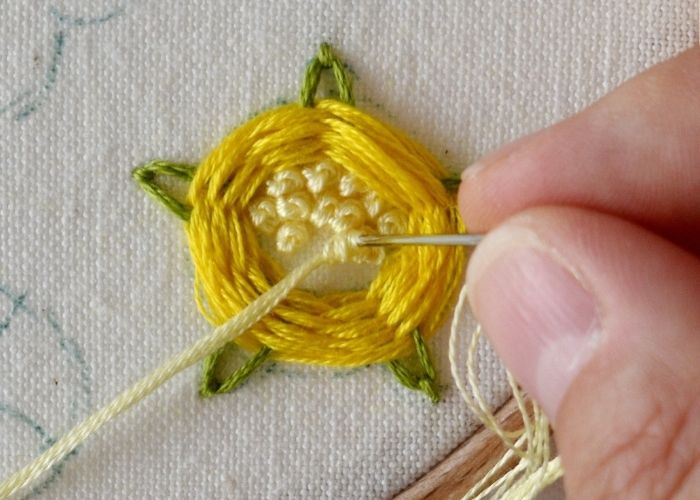 Woven Wheel and Fly stitch step 5 image