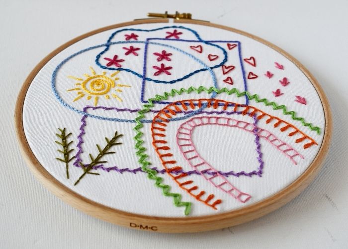 14 variations of Chain Stitch sampler framed in a hoop image