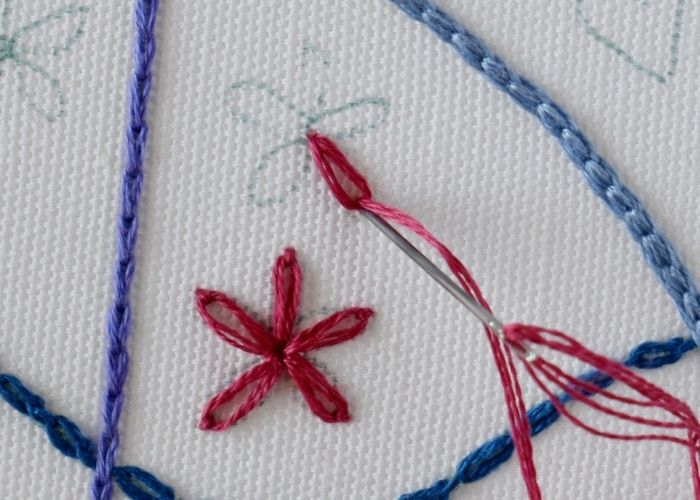 Chain Stitch variations Lazy Daisy Stitch step 1 image