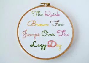 Hand embroidery lettering sampler framed in the hoop image