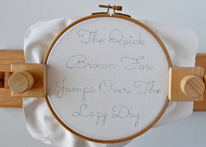 Lettering sampler stretched in the hoop and ready to stitch image