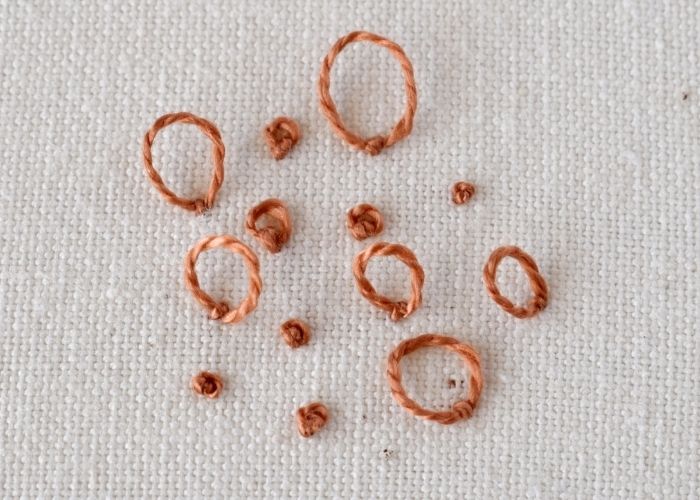 Peking Knot stitch embroidery loops and knots image