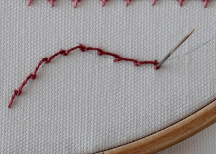 Scroll Stitch embroidery in process image