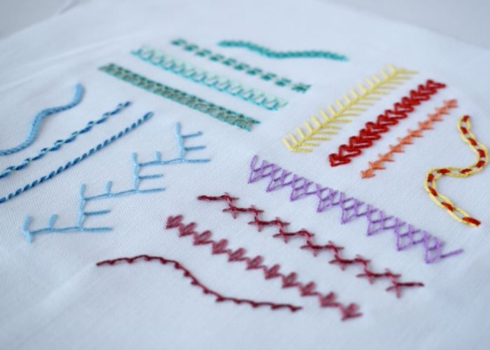 Simple Stitches For Borders sampler washed an ironed image