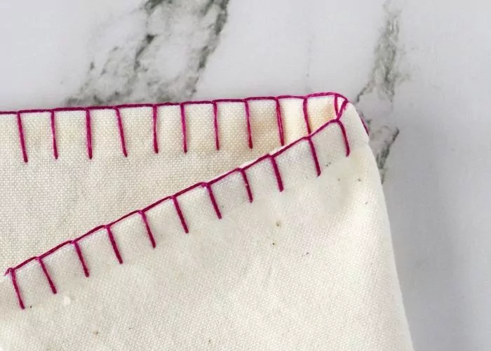 Blanket stitch edging - front and reverse sides image